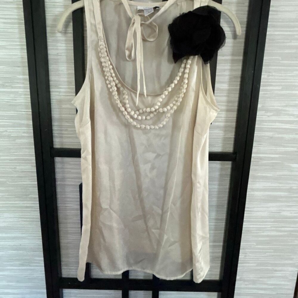 LOFT classy cream colored silky sleeveless blouse size m
